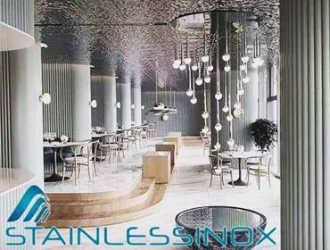 Interior of a restaurant with a spacious table and chairs